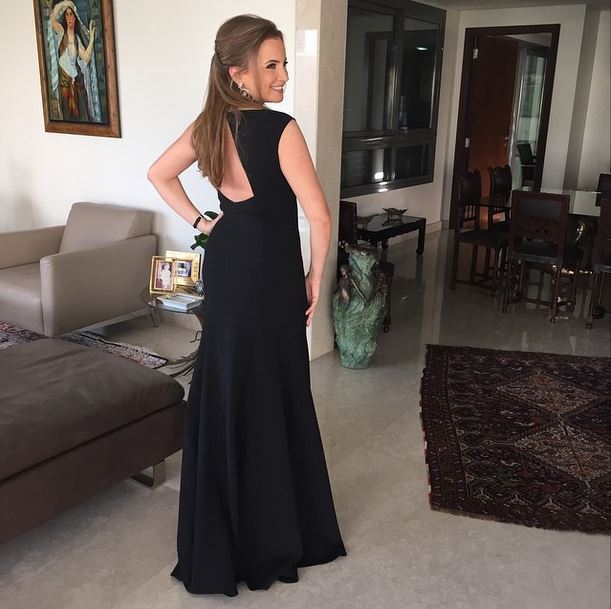 Tania Kassis in a long black dress