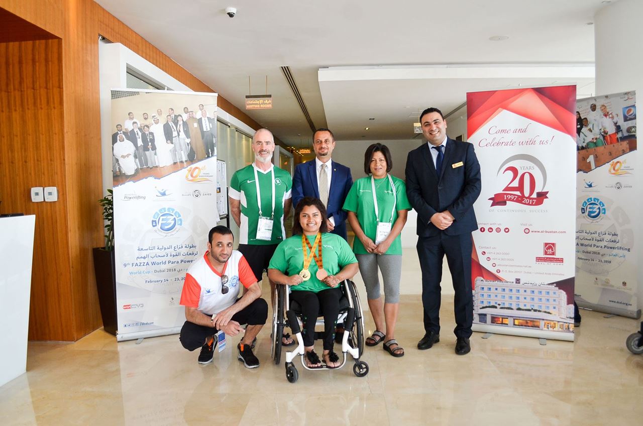 Yasser Moussa - Executive Assistant Manager along with the Gold winner at the 9th Fazza Para Powerlifting Games 2018 - Brittany and her coach at the Al Bustan Center & Residence Hotel Lobby.