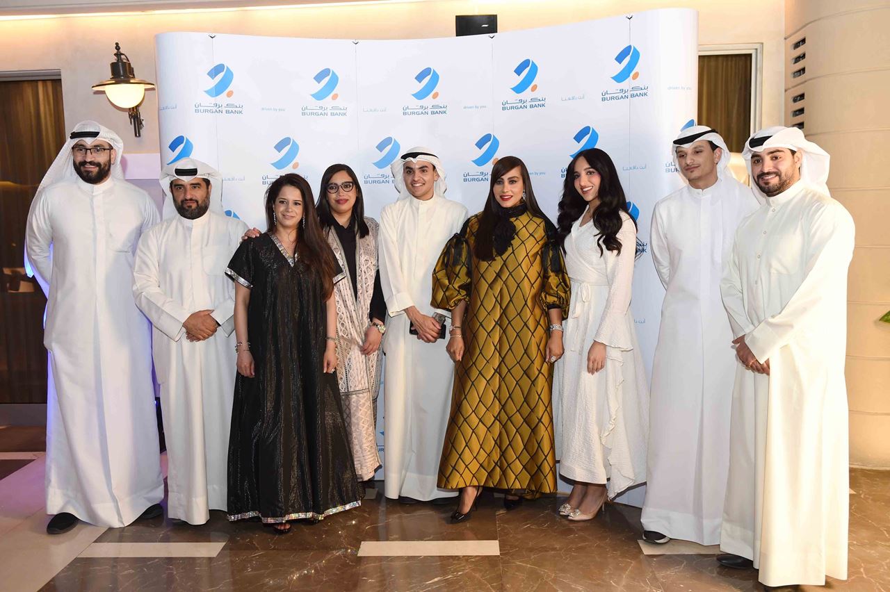 Group photo of the PR and Communications team at Burgan Bank during the Ghabqa