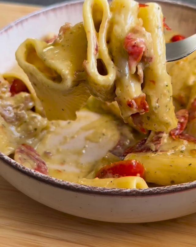 Paccheri with Stracchino Cream, Pesto, Crispy Speck and Cherry Tomatoes